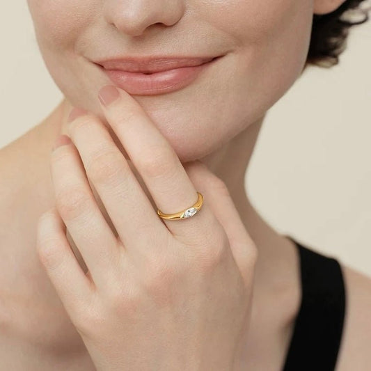 1 carat marquise lab grown diamond solitaire ring, set in 14k yellow gold