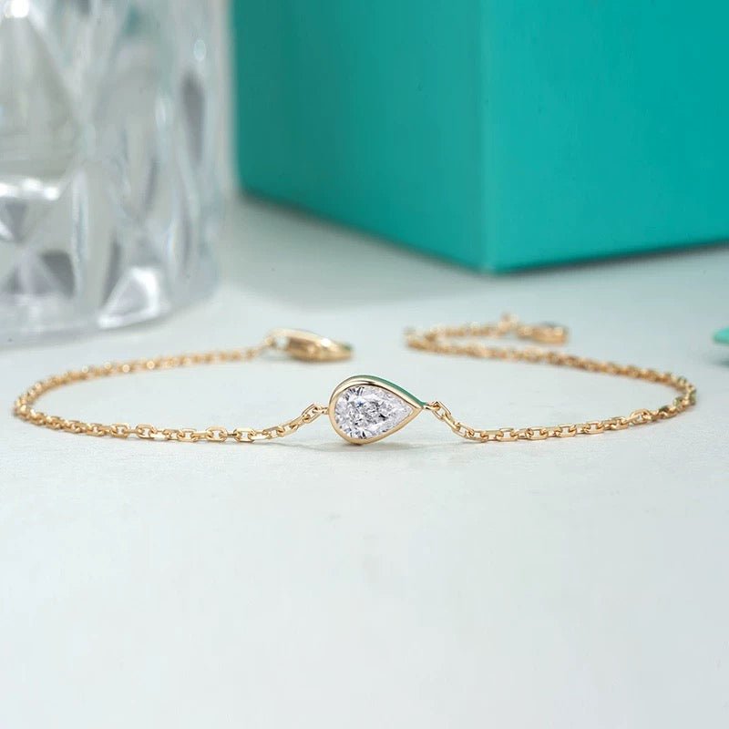 0.5carat pear shape lab grown diamond bracelet for women, set in 9k yellow gold