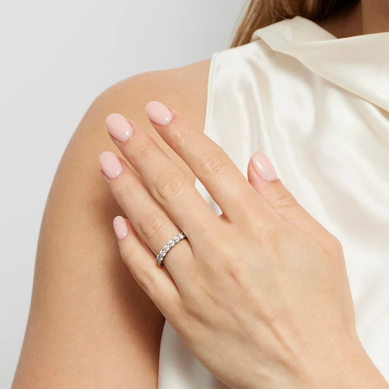 simple 2 carat round brilliant diamond wedding band, ideal for couples