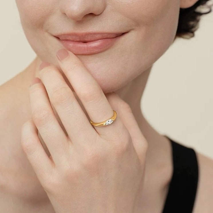 1 carat marquise lab grown diamond solitaire ring, set in 14k yellow gold